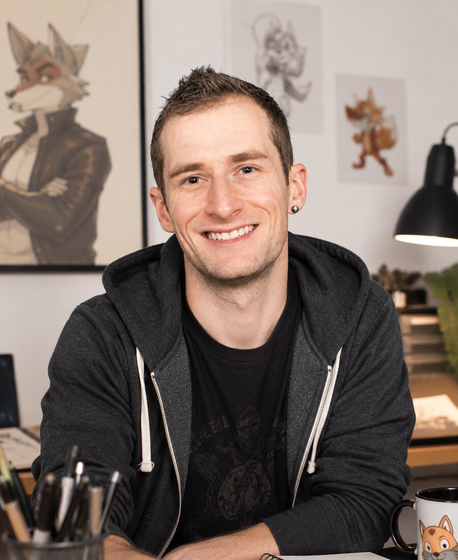 Anthony Peltier, graphiste et illustrateur freelance, dans son atelier